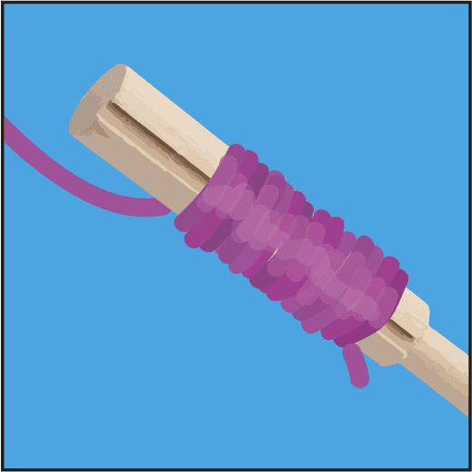 Yarn wrapped around a yarn cutter guide.