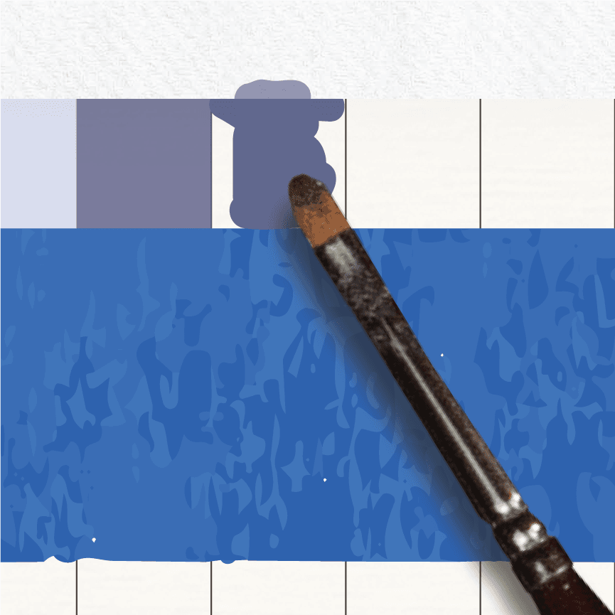 A brush controlling paint edges along a taped painted block surface.